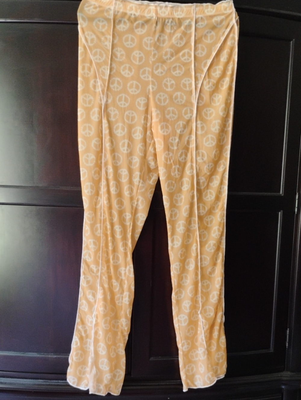 Urban Outfitters Peach Wide-Leg Pants with White Peace Sign Print